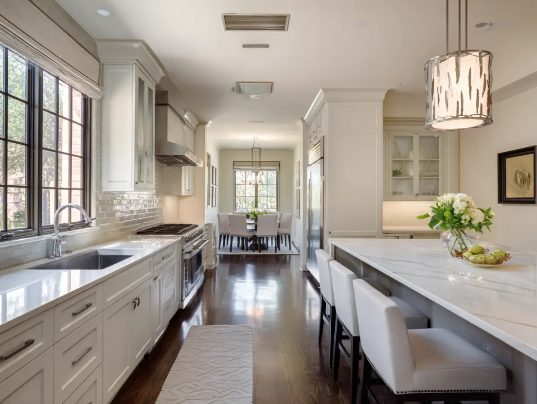Open concept kitchen remodel connecting to living area in Austin home